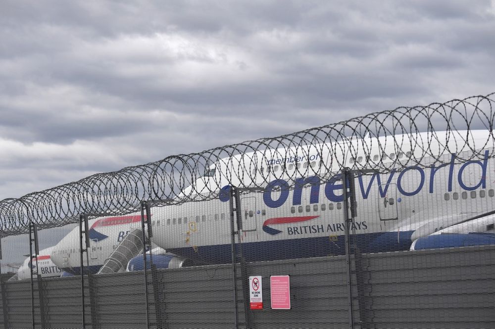 British Airways planes are parked at Heathrow airport in London on April 2, 2020. According to reports British Airways is expected to suspend 36,000 staff amid the coronavirus crisis. u00e2u20acu201d AFP pic