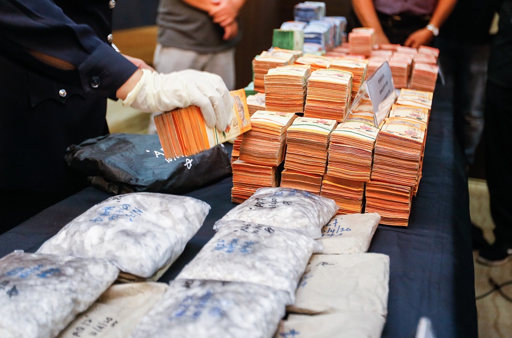 The drugs and bank notes seized during a drug bust in George Town April 13, 2020. ― Picture by Sayuti Zainudin