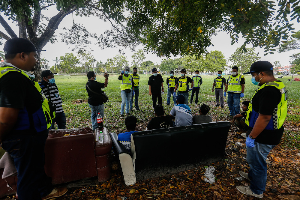 Several people were arrested by the police after disobeying the movement control order in Bagan Lalang, Butterworth April 9, 2020. u00e2u20acu201d Picture by Sayuti Zainudin