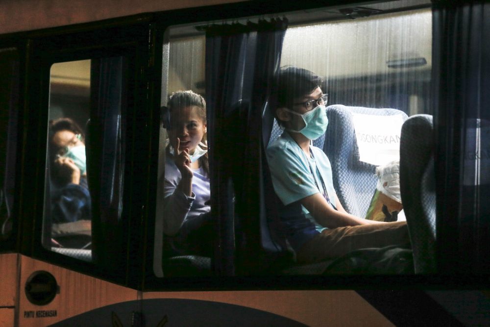 The first batch of university students arrive at the Northern Seberang Perai Land and District Office, Bukit Mertajam on a bus April 28, 2020. u00e2u20acu201d Picture by Sayuti Zainudin