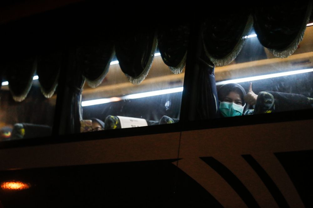 The first batch of university students arrive at the Northern Seberang Perai Land and District Office, Bukit Mertajam on a bus April 28, 2020. u00e2u20acu201d Picture by Sayuti Zainudin