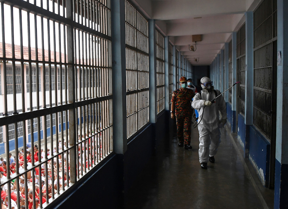 Pahang Bomba and Rescue Department personnel disinfecting Penor Prison in Pahang April 14, 2020. u00e2u20acu201d Bernama pic