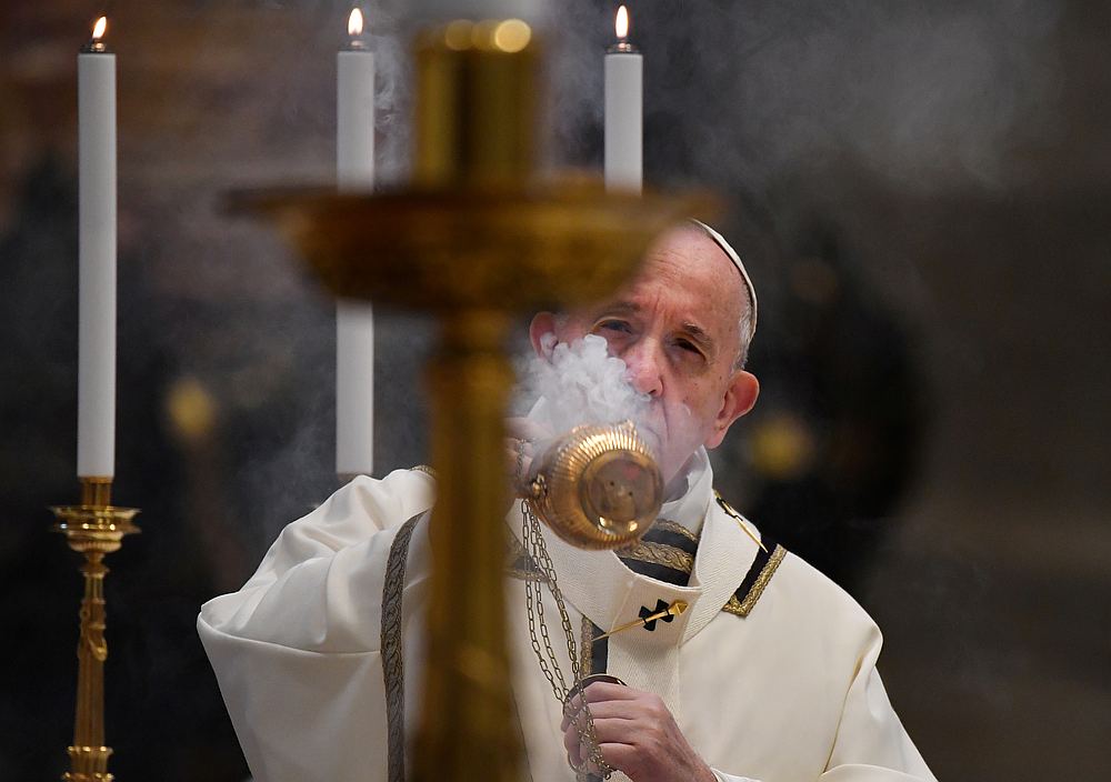 Pope Francis celebrates Easter Sunday Mass behind closed doors due to an outbreak of Covid-19 at St Peter's Basilica in the Vatican, April 12, 2020. u00e2u20acu201d Andreas Solaro/pool pic via Reuters