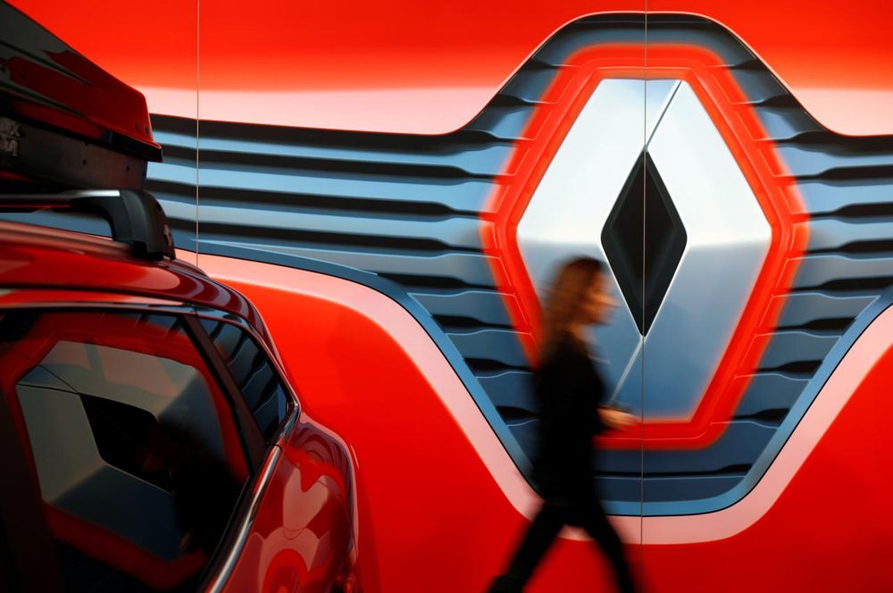 An employee walks in front of the displayed logo of Renault carmaker at a dealership in Saint-Herblain, near Nantes, France, February 19, 2020. u00e2u20acu201d Reuters pic