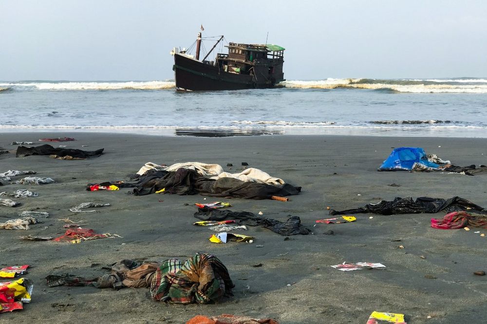 nFile picture shows belongings of Rohingya refugees laying on the shore as their carrier boat remains anchored nearby in Teknaf on April 16, 2020. u00e2u20acu201d AFP pic