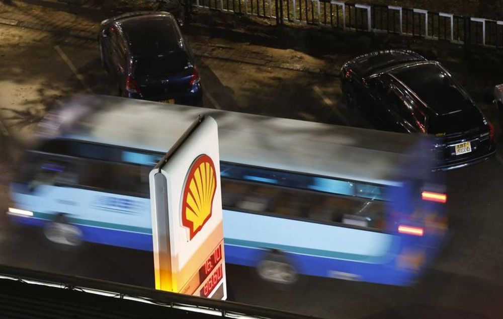 A bus drives past a Shell service station with the prices displayed of petrol and diesel on a signage in Kenya's capital Nairobi, February 6, 2016. u00e2u20acu201d Reuters pic