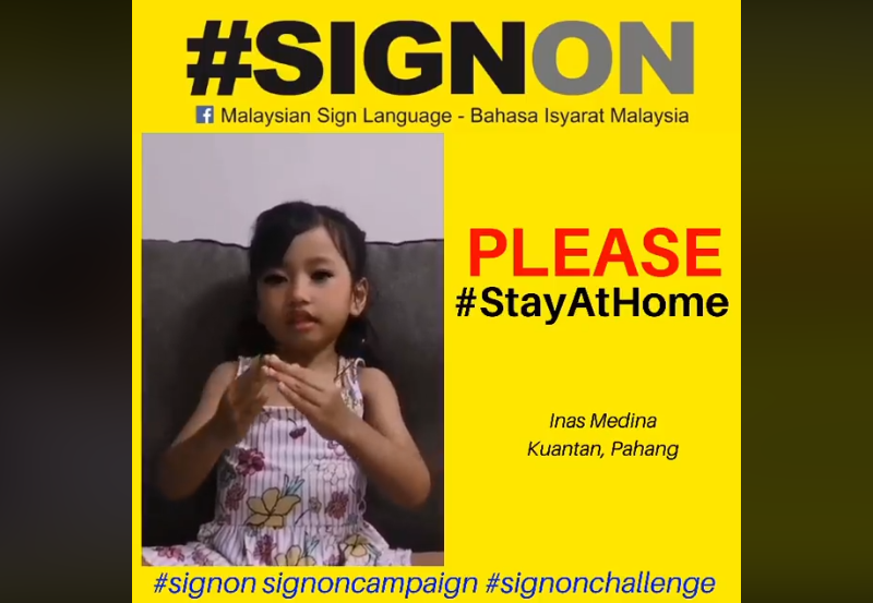 Inas Medina, from Kuantan, Pahang, advises members of the public to stay home in a sign language video. u00e2u20acu201d Facebook screenshot