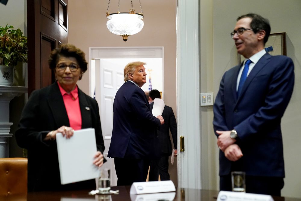US President Donald Trump is flanked by Small Business Administration (SBA) Administrator Jovita Carranza and Treasury Secretary Steven Mnuchin at the White House in Washington, April 7, 2020. u00e2u20acu201d Reuters pic