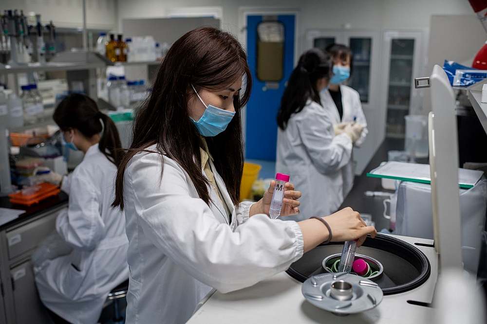 Engineers work on an experimental vaccine for the Covid-19 coronavirus at the Quality Control Laboratory at the Sinovac Biotech facilities in Beijing April 29, 2020. u00e2u20acu201d AFP pic