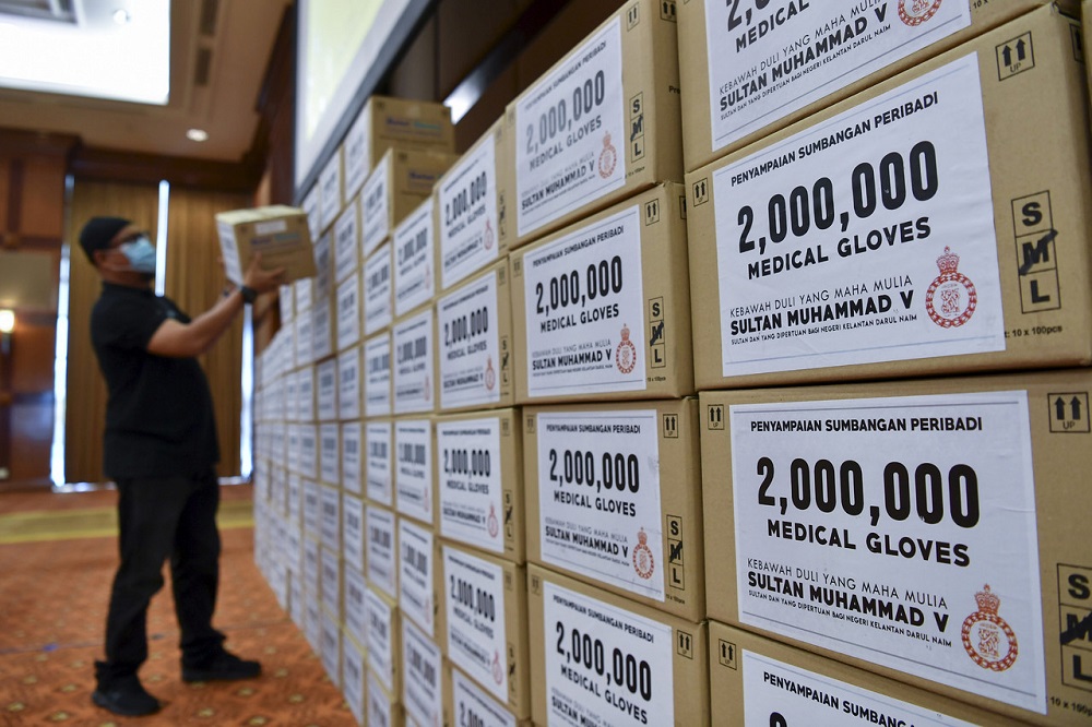 Sultan of Kelantan, Sultan Muhammad V contributed two million rubber medical gloves to the Health Ministry today. u00e2u20acu2022 Bernama pic