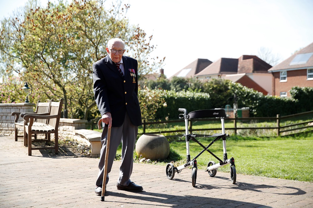 Retired British Army Captain Tom Moore, 99, raises money for health workers by attempting to walk the length of his garden one hundred times before his 100th birthday this month in Marston Moretaine, Britain April 15, 2020. u00e2u20acu2022 Reuters pic