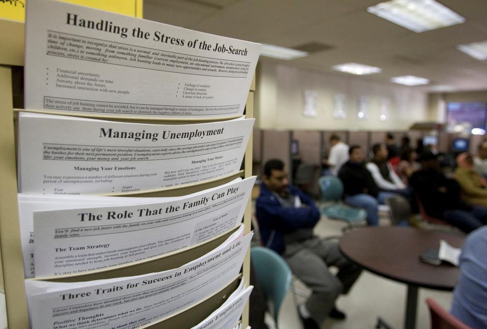 File picture shows people waiting for assistance at the Virginia Employment Commission office in Alexandria, Virginia, November 6, 2009. u00e2u20acu201d Reuters pic