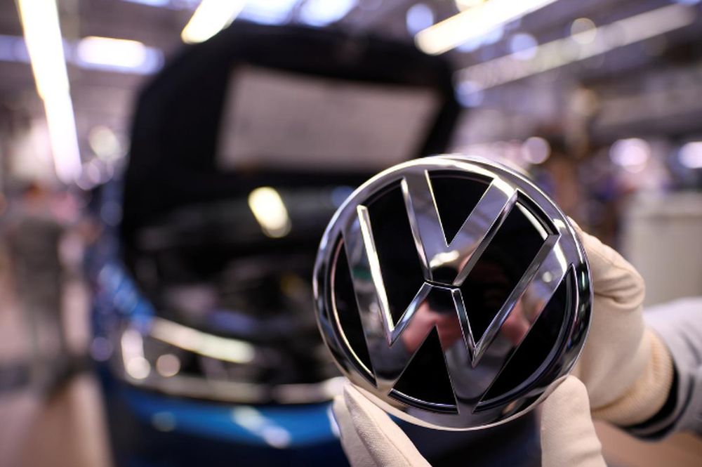 An employee holds a Volkswagen logo in a production line at the Volkswagen plant in Wolfsburg, Germany March 1, 2019. u00e2u20acu201d Reuters pic