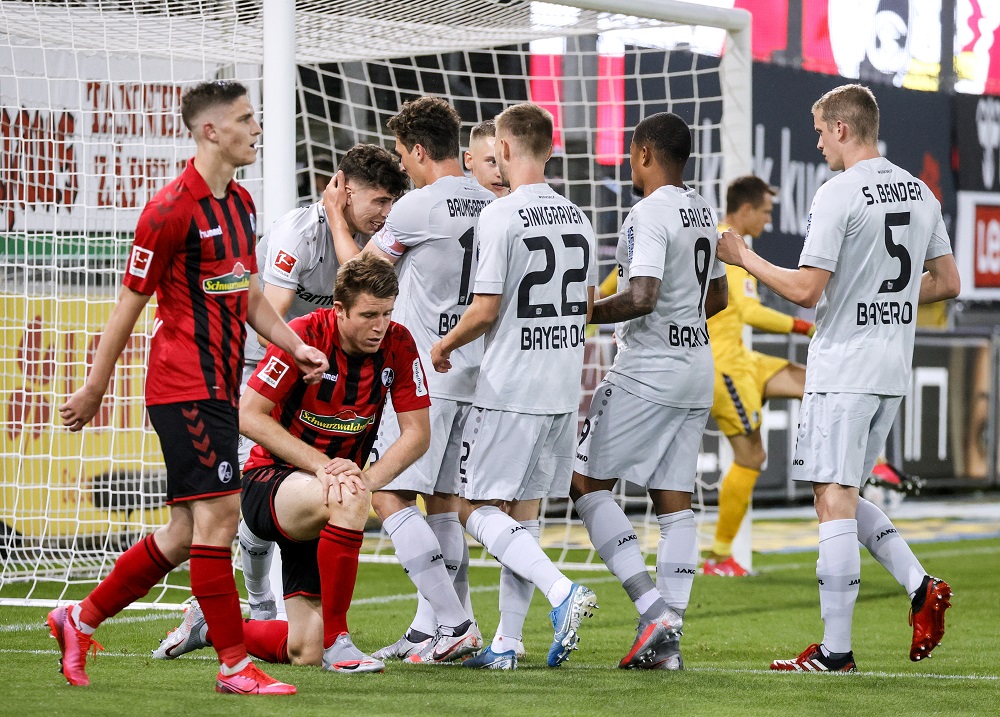 Bayer Leverkusen's Kai Havertz celebrates scoring their first goal with teammates at the Schwarzwald stadium in Freiburg, Germany May 29, 2020. u00e2u20acu201d Picture by Ronald Wittek/Pool via Reuters