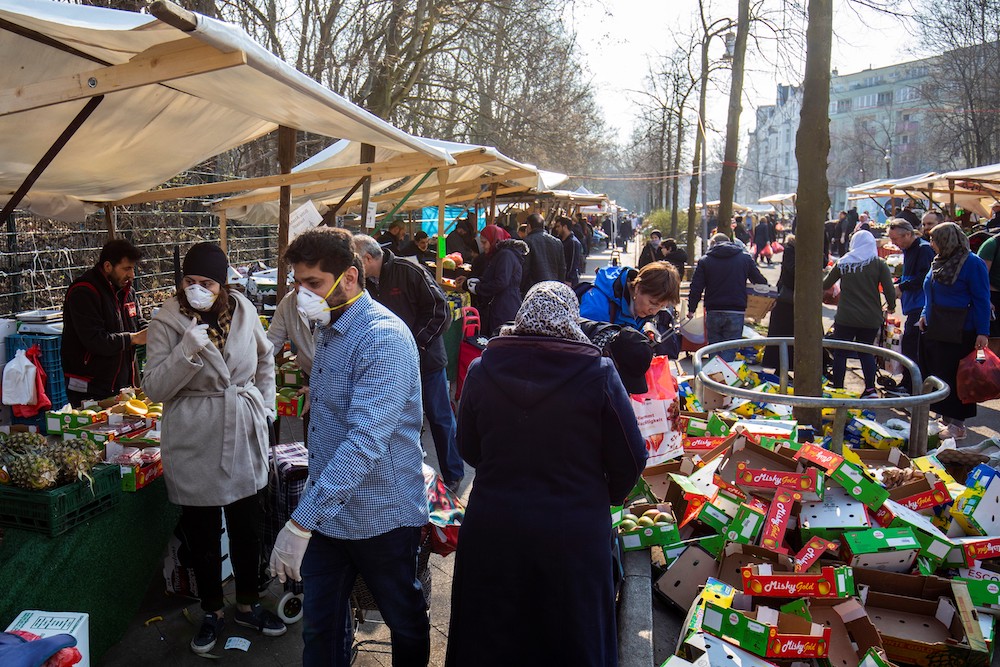 In this file photo taken on March 28, 2020 shoppers crowd the Yorck Strasse market in Berlin amid the novel coronavirus pandemic. u00e2u20acu201d AFP pic