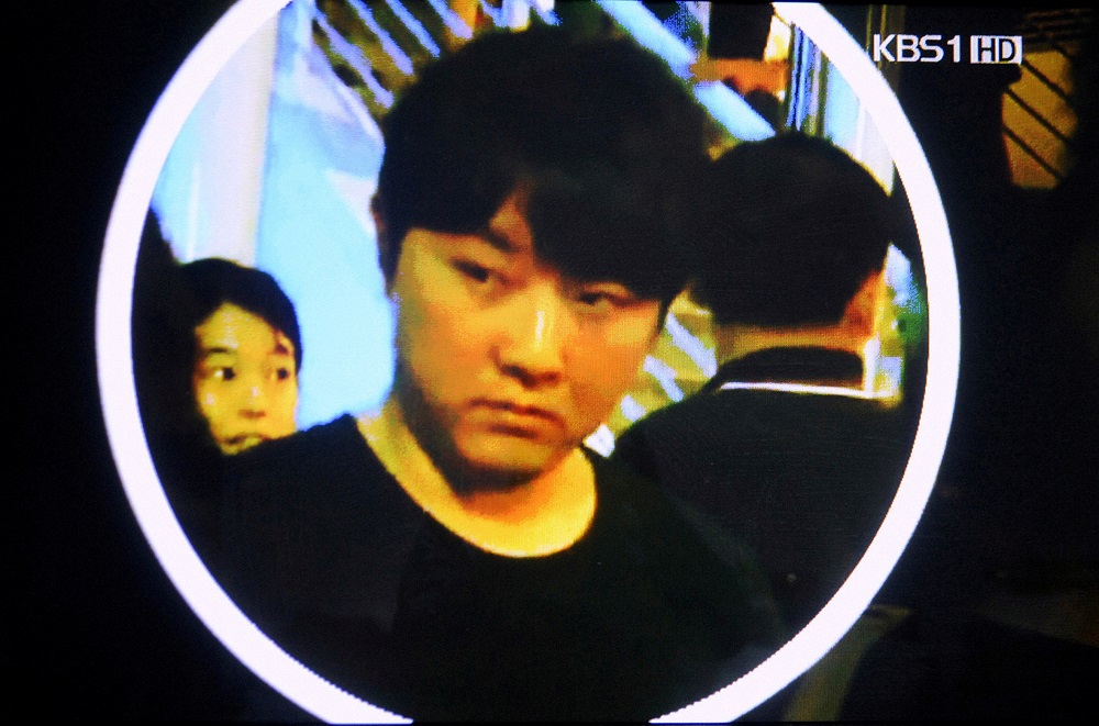 A still image taken from a Korean Broadcasting System video and provided by the Kyodo news agency, shows a man reported by the network to be Kim Jong-chol at an Eric Clapton concert in Singapore February 14, 2011. — Picture courtesy of Japan Out via Reuters