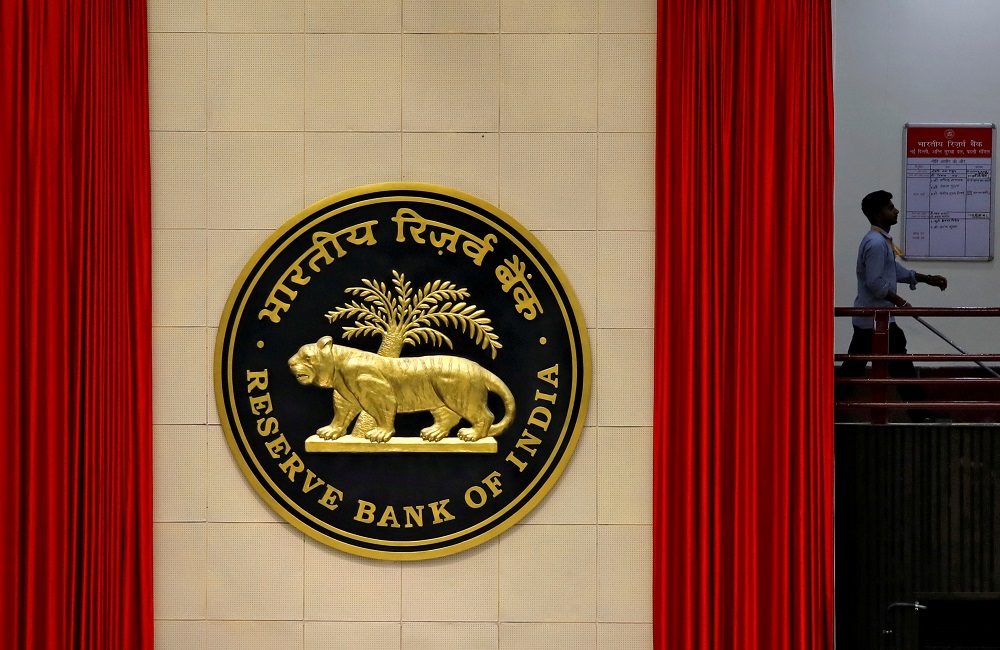 A worker walks past the logo of Reserve Bank of India (RBI) inside its office in New Delhi July 8, 2019. u00e2u20acu201d Reuters pic