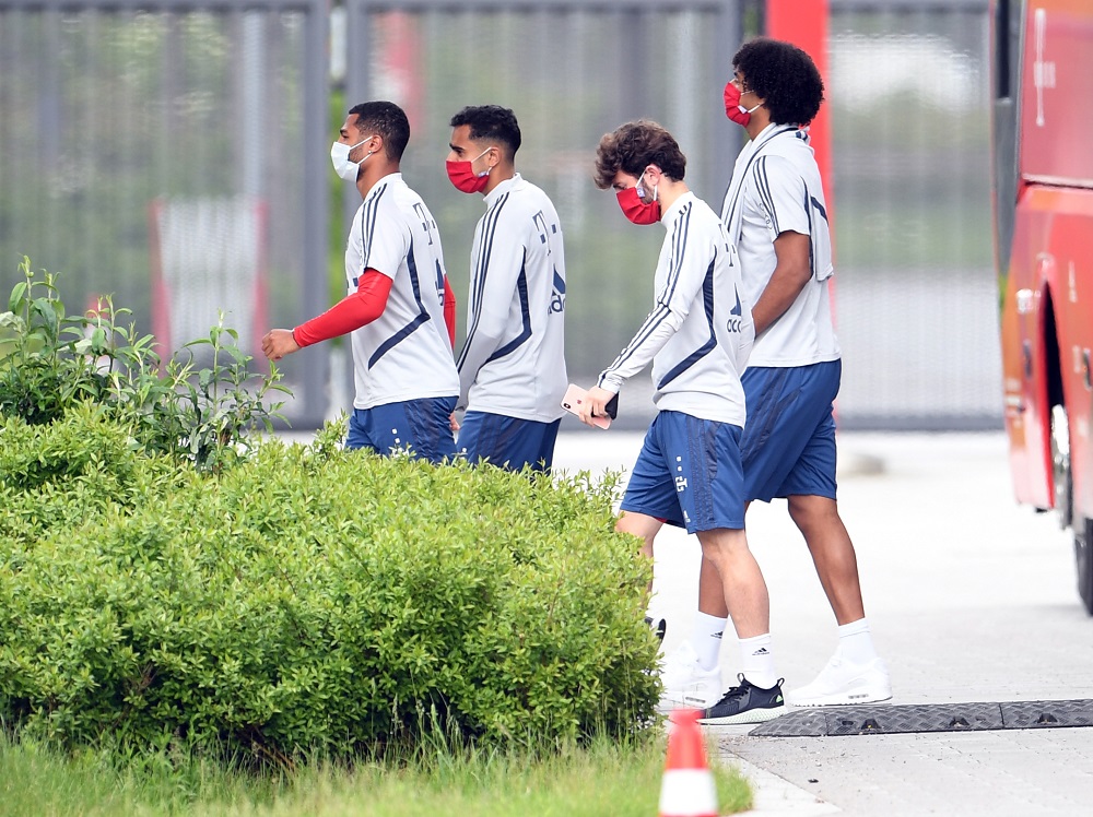 FC Bayern players with protective masks leave a bus for the training ground, amid the spread of the coronavirus disease (Covid-19) in Unterschleissheim near Munich, Germany, May 14, 2020. u00e2u20acu201d Reuters pic
