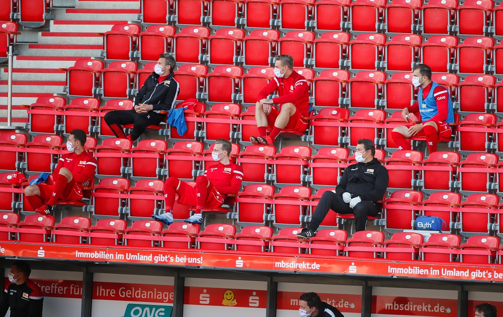 Union Berlin substitutes wearing face masks maintain social distance in the stands during the match against Bayern Munich at the Stadion An der Alten Forsterei in Berlin May 17, 2020. u00e2u20acu201d Reuters pic