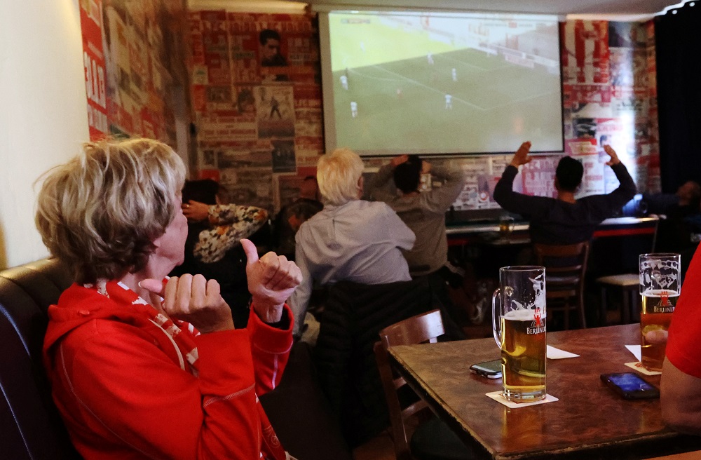 Fans watch the game in a bar in Berlin, as play resumes behind closed doors following the Covid-19 outbreak May 17, 2020. u00e2u20acu201d Reuters pic