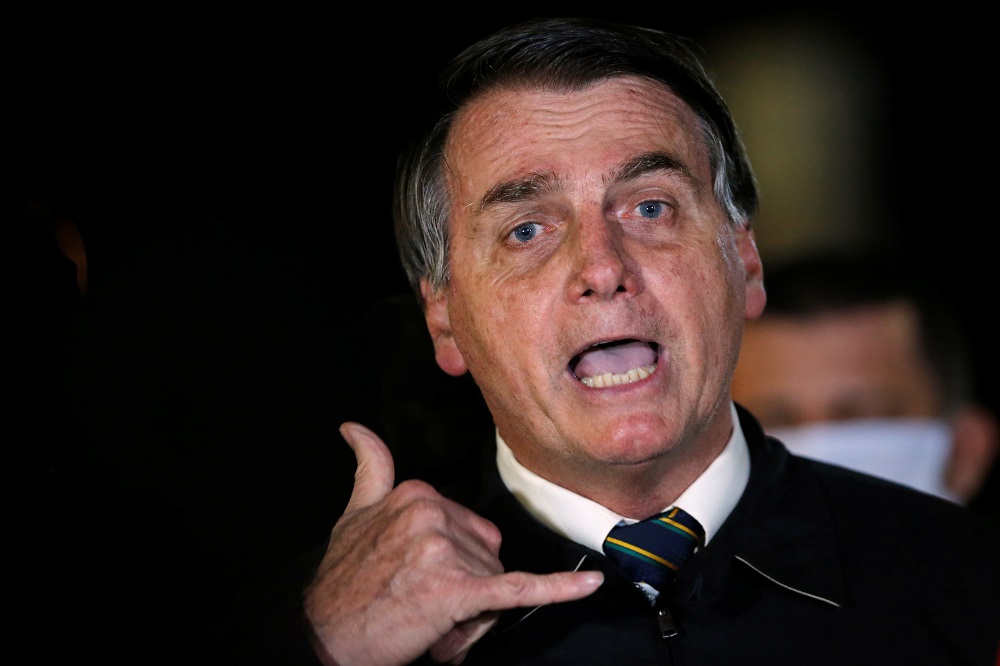 Brazilu00e2u20acu2122s President Jair Bolsonaro speaks with journalists as he arrives at Alvorada Palace, amid the Covid-19 outbreak in Brasilia May 22, 2020. u00e2u20acu201d Reuters pic