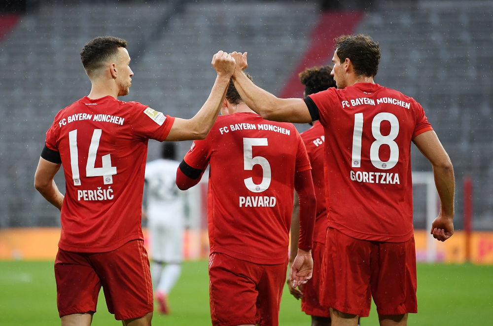 Bayern Munich's Leon Goretzka celebrates scoring their first goal with Ivan Perisic during their match against Eintracht Frankfurt at the Allianz Arena in Munich May 23, 2020. u00e2u20acu201d Reuters pic