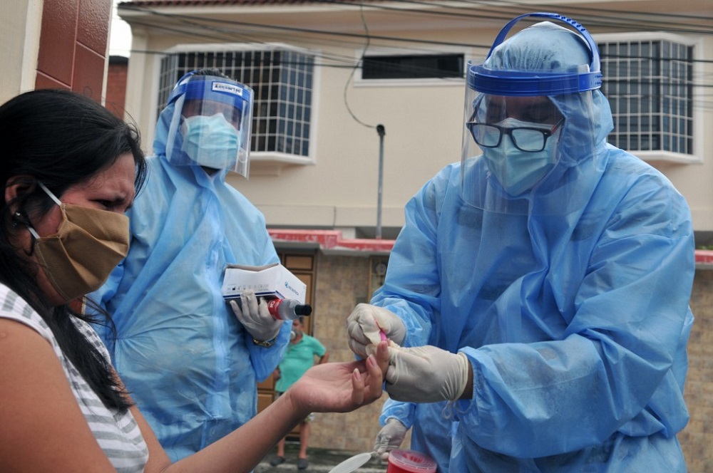Health workers make a fast test for Covid-19 to a woman in the north of Guayaquil, Ecuador April 30, 2020. u00e2u20acu201d AFP pic