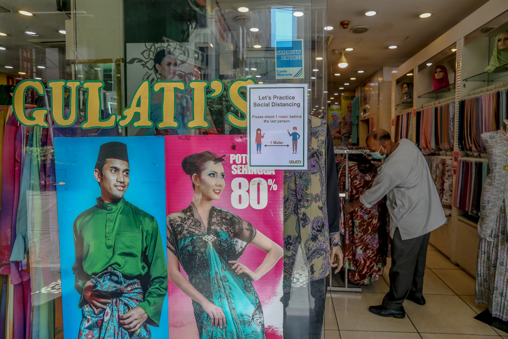 Gulati's Silk House does not need to worry about rent as it owns its premises, said Lavlu. — Picture by Firdaus Latif