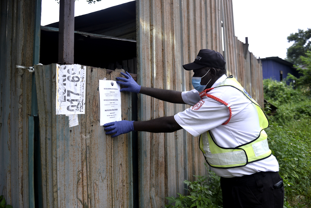 A shop and rumah kongsi in Setia Alam is sealed by the Ministry of Health after three migrant workers tested positive for Covid-19 May 10, 2020. — Picture by Miera Zulyana