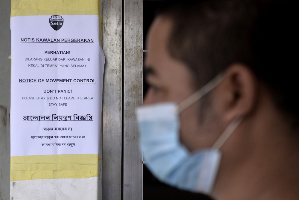 A shop and rumah kongsi in Setia Alam is sealed by the Ministry of Health after three migrant workers tested positive for Covid-19 May 10, 2020. u00e2u20acu201d Picture by Miera Zulyana