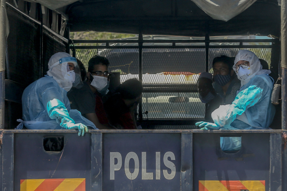Some of the undocumented migrants at Selayang Baru that were arrested by the Immigration Department during a raid on May 14, 2020. u00e2u20acu201d Picture by Firdaus Latif