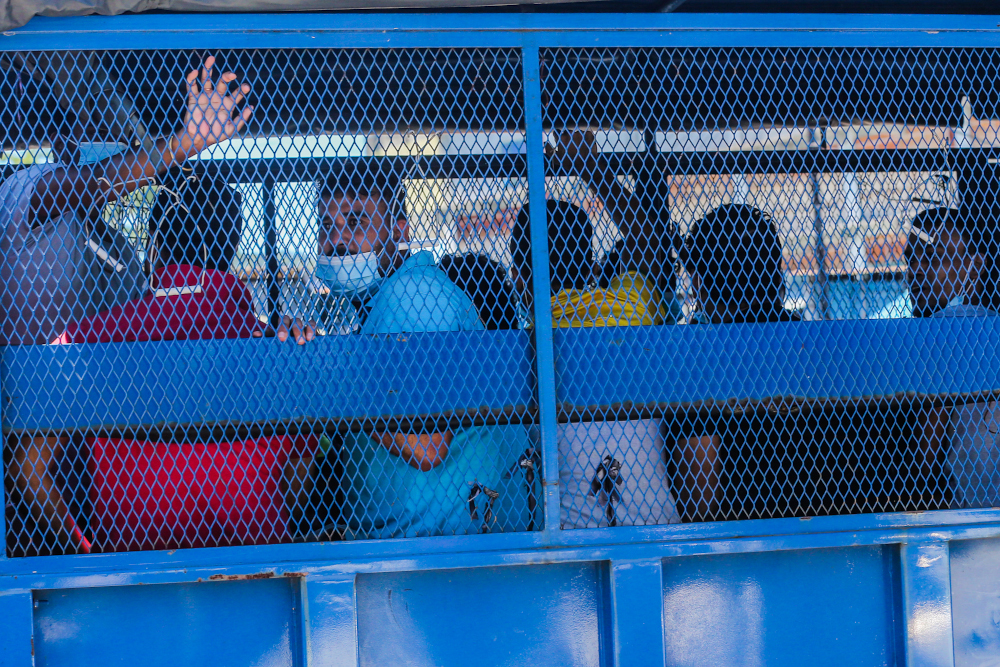 Some of the undocumented migrants at Selayang Baru that were arrested by the Immigration Department during a raid on May 14, 2020. — Picture by Firdaus Latif