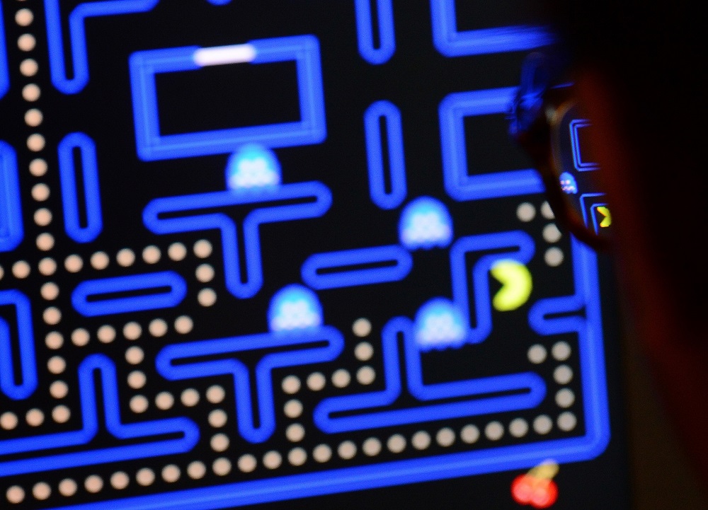 An employee plays the video game Pac-Man (1980) during an exhibition preview featuring 14 video games acquired by The Museum of Modern Art (MoMA) in New York. u00e2u20acu201d AFP pic