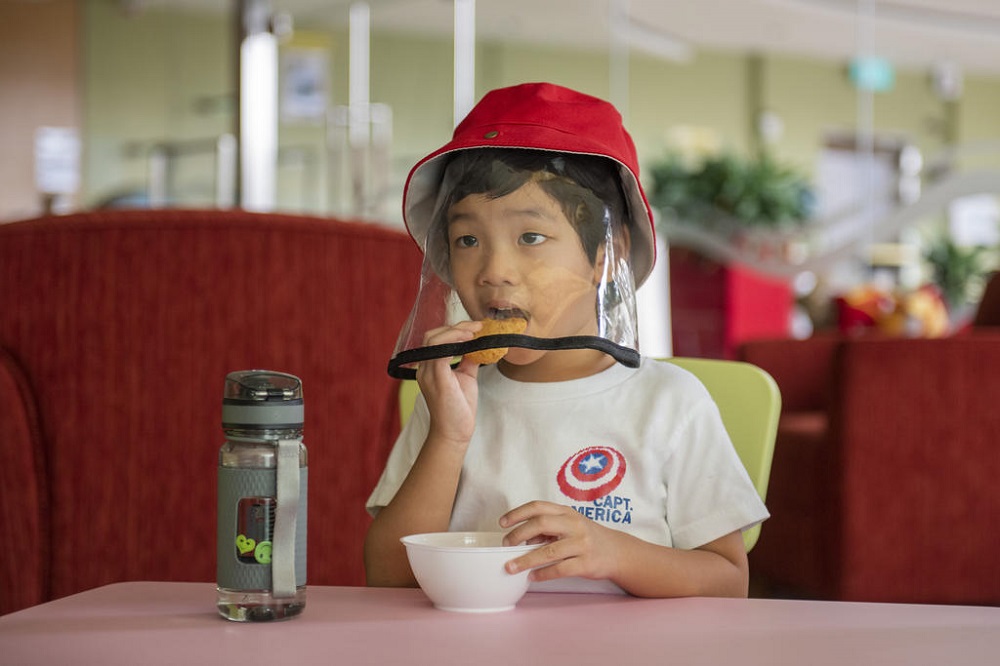 Temasek Foundation, the philanthropic arm of state investor Temasek Holdings, will give each pre-school and primary school student a face shield, which they can use in place of a mask. u00e2u20acu201d TODAY pic