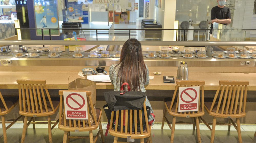 People are seen dining in as they practise social distancing at one of the shopping malls in Kuala Lumpur, May 26, 2020 u00e2u20acu201d Picture by Shafwan Zaidon