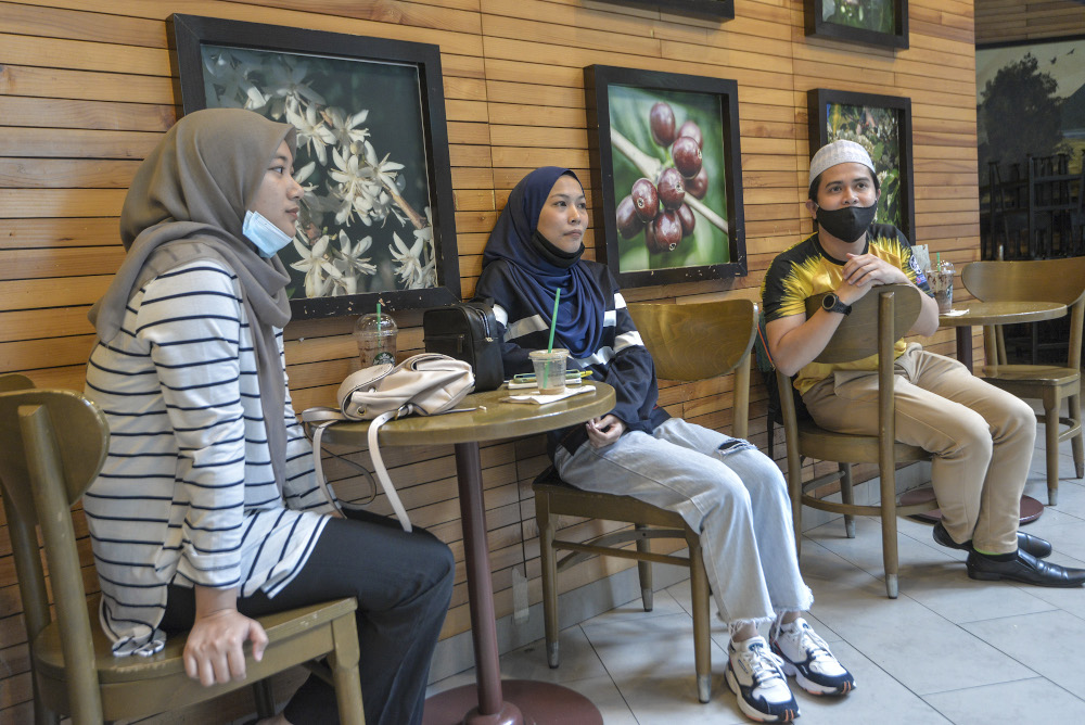 (From left) Wan Norfatin Afiqah Najwa, Nur Ajla and Muhammad Mu’adz speak to a reporter during an interview at Nu Sentral in Kuala Lumpur May 26, 2020 — Picture by Shafwan Zaidon