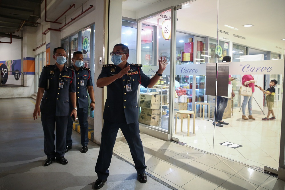 Selangor Fire and Rescue Department director Norazam Khamis (right) speaks to Malay Mail during his visit to The Curve in Petaling Jaya May 29, 2020. — Picture by Yusof Mat Isa