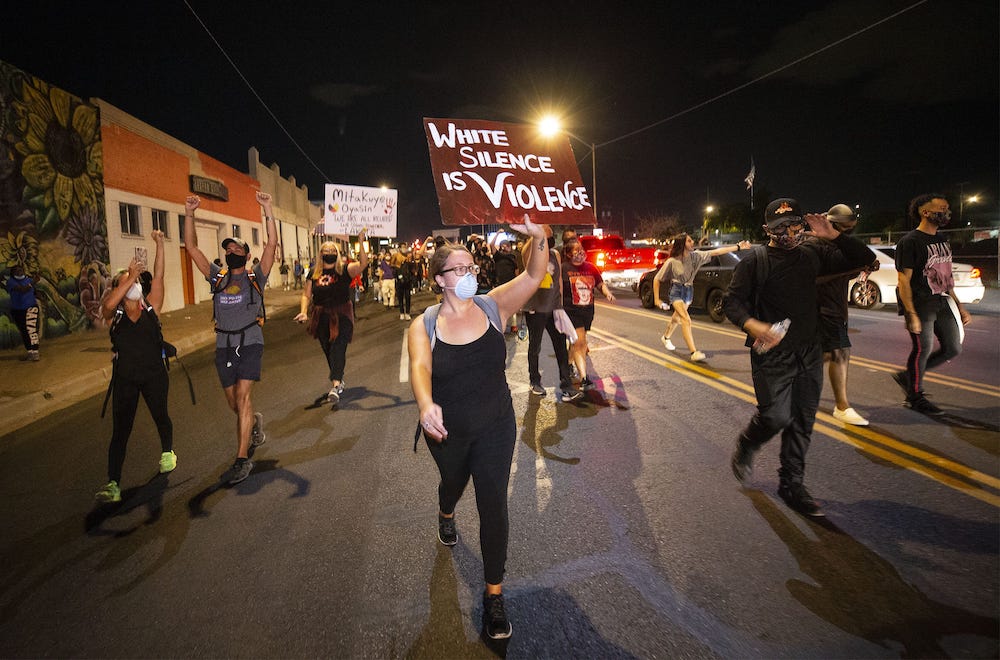 Protesters march around downtown Phoenix on May 30, 2020, to honor the life of George Floyd, 46, who died under the knee of a Minneapolis police officer on Monday. u00e2u20acu201d Reuters pic