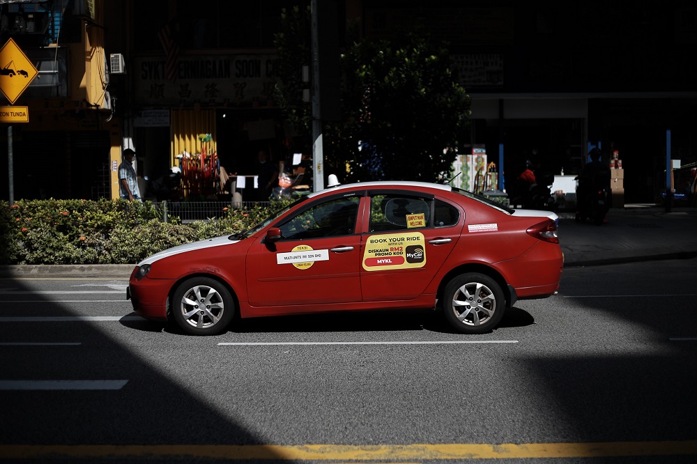 A taxi is pictured on the first day of the conditional movement control order in Kuala Lumpur May 4, 2020. — Picture by Ahmad Zamzahuri