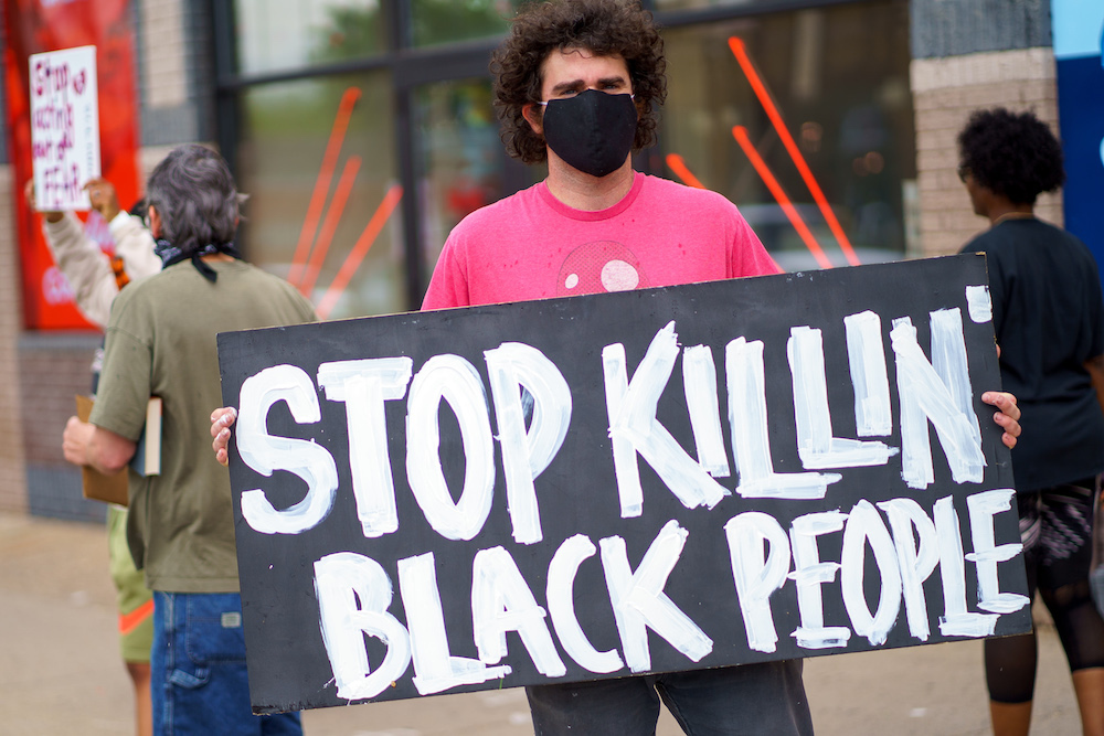 A man holds a u00e2u20acu02dcStop Killing Black Peopleu00e2u20acu2122 placard while protesting near the area where a Minneapolis Police Department officer allegedly killed George Floyd in Minneapolis, Minnesota May 26, 2020. u00e2u20acu201d AFP pic