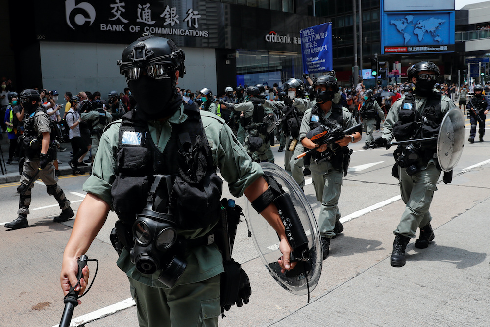 Hong Kong court throws out private case against officer who shot ...