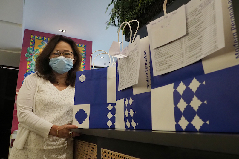 Christina Keilthy, co-founder of Peranakan restaurant Godmama, has designed items on the menu with delivery in mind. — TODAY pic