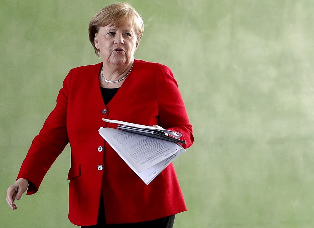 German Chancellor Angela Merkel arrives for a press conference at the Chancellery in Berlin, May 6, 2020 after holding a video conference with the leaders of the Federal states on easing the coronavirus pandemic lockdown restrictions. u00e2u20acu201d AFP pic