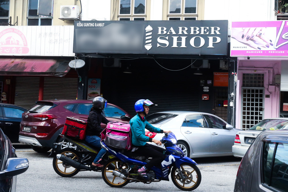 Barber shops in Subang closed during the conditional movement control order May 11, 2020. — Picture by Choo Choy May