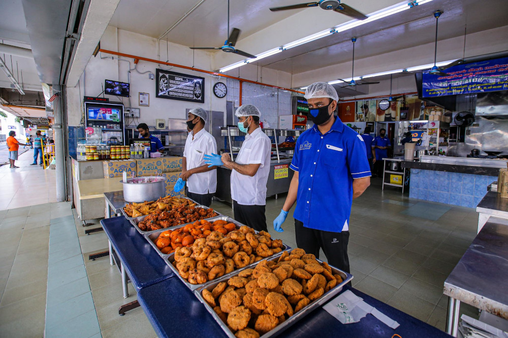 On the first day of the enhanced movement control order (EMCO), eateries refrain from accepting dine-in customers at Selangor Mansion May 4, 2020. u00e2u20acu201d Picture by Hari Anggara 