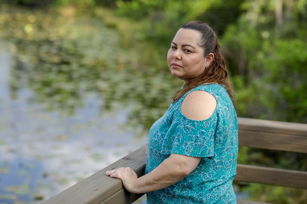 Claudia Alejandra, 37, furloughed from her job at the makeup counter at Macyu00e2u20acu2122s amid the coronavirus disease (COVID-19), poses for a portrait near a lake in Orlando, Florida, US, March 6, 2020. u00e2u20acu201d Reuters pic