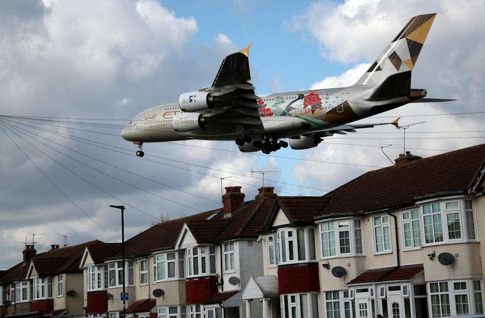 An Etihad Airbus A380 aircraft arrives over the top of residential houses to land at Heathrow Airport in west London, Britain, February 27, 2020. u00e2u20acu201d Reuters pic