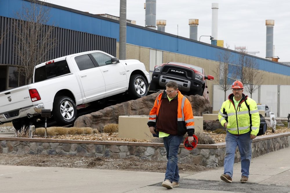 Autoworkers leave FCA Chrysler Warren Truck Assembly in Detroit, Michigan, March 18, 2020. US industrial production dropped a record 11.2 percent in April, the first full month of widespread business lockdowns. u00e2u20acu201d AFP pic