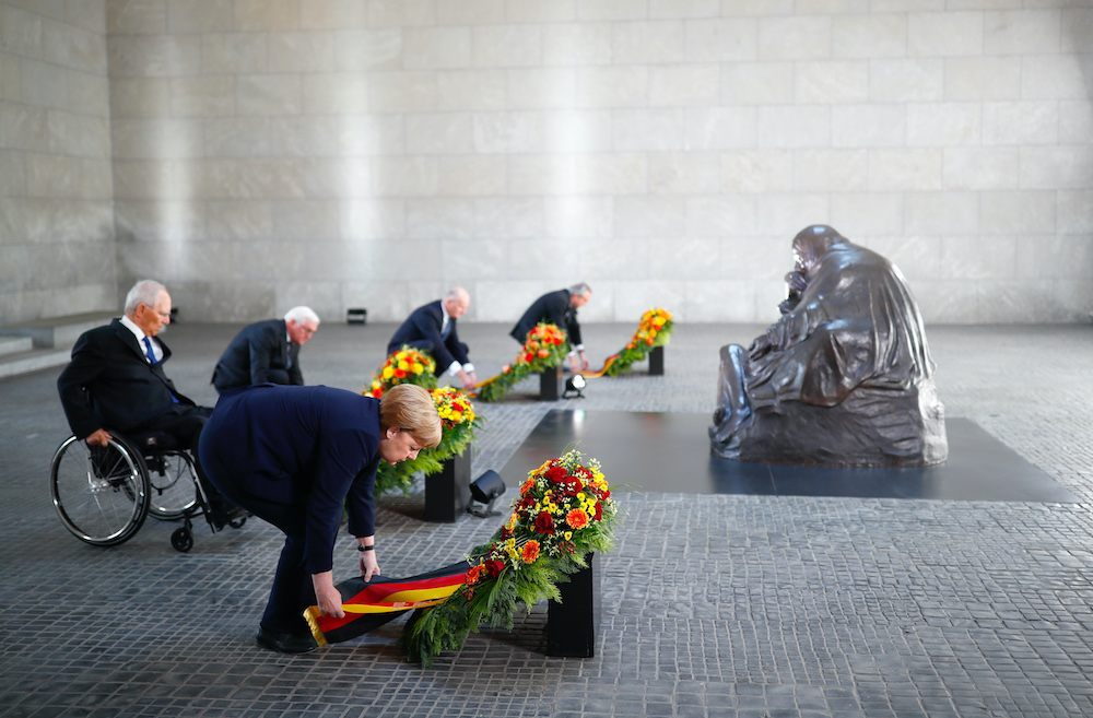German Chancellor Angela Merkel attend a wreath laying ceremony with political dignitaries to mark the 75th anniversary of the end of World War Two, at the Neue Wache Memorial in Berlin, Germany, May 8, 2020. — Reuters pic