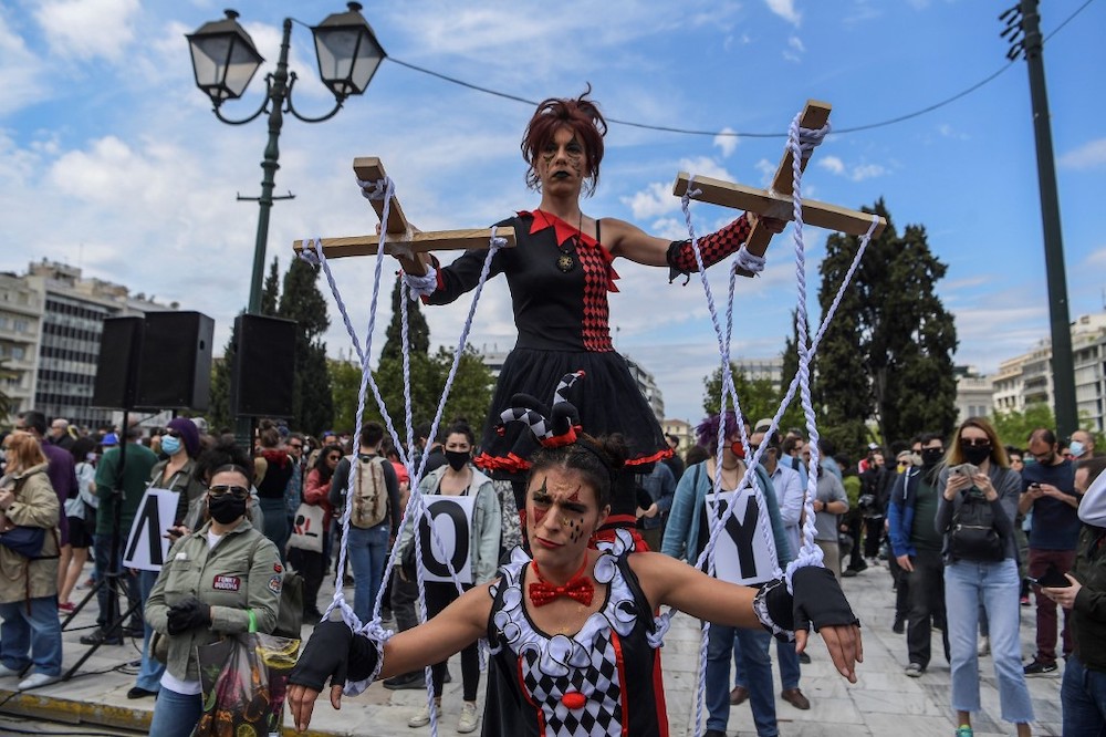 Greek artists and members of artist unions demonstrate at the Syntagma square, in central Athens, on May 7. — AFP pic